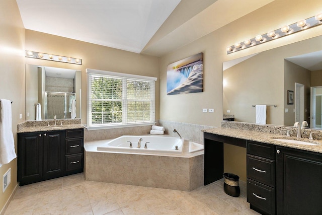 4 Tournament Dr S, Hawthorn Woods, IL 60047 - full bath with two vanities, a shower stall, a garden tub, tile patterned floors, and vaulted ceiling