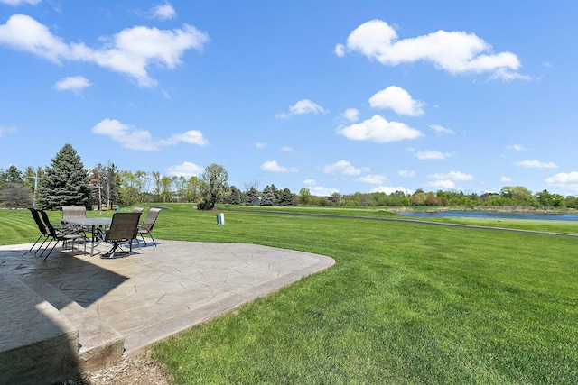 4 Tournament Dr S, Hawthorn Woods, IL 60047 - view of green lawn featuring a water view, a patio area, and outdoor dining area