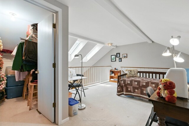 bedroom featuring carpet floors and a skylight