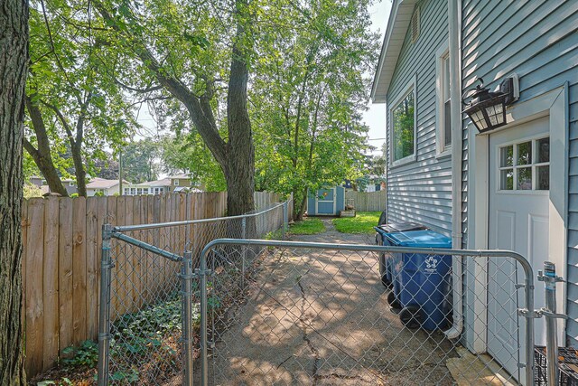 6124 Chase Ave, Downers Grove, IL 60516 - fenced backyard featuring a gate and a storage shed