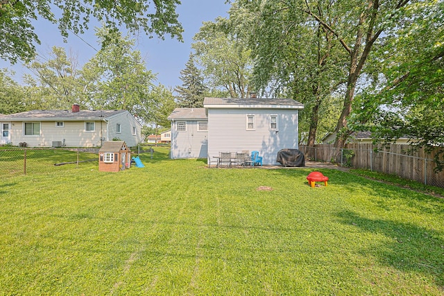 6124 Chase Ave, Downers Grove, IL 60516 - view of yard featuring a playground and an outbuilding