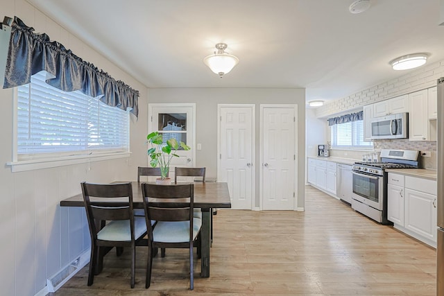 6124 Chase Ave, Downers Grove, IL 60516 - dining area featuring light wood-style flooring