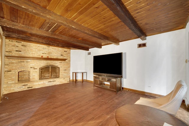 24644 S Mulberry Ln, Crete, IL 60417 - unfurnished living room featuring wood ceiling with exposed beams, wood finished floors, baseboards, and a fireplace