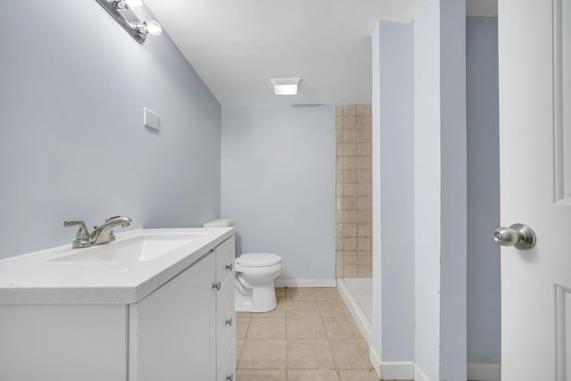 24644 S Mulberry Ln, Crete, IL 60417 - full bath featuring toilet, vanity, tile patterned flooring, tiled shower, and baseboards