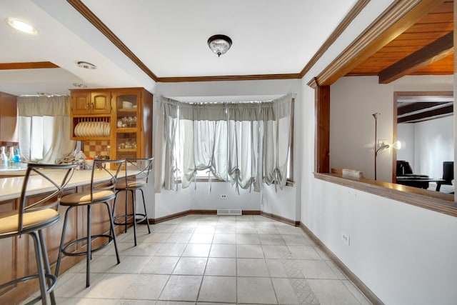 24644 S Mulberry Ln, Crete, IL 60417 - dining space with crown molding, baseboards, and light tile patterned floors