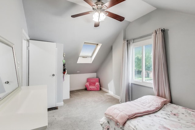 614 Beach Ave, La Grange Park, IL 60526 - bedroom with lofted ceiling, a skylight, carpet floors, and a ceiling fan