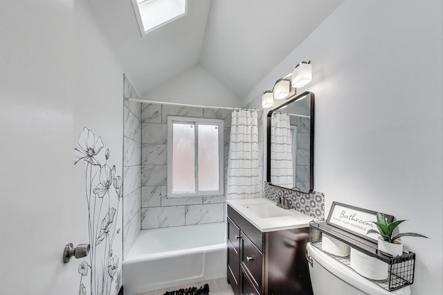 614 Beach Ave, La Grange Park, IL 60526 - bathroom with vanity, shower / bathtub combination, and lofted ceiling