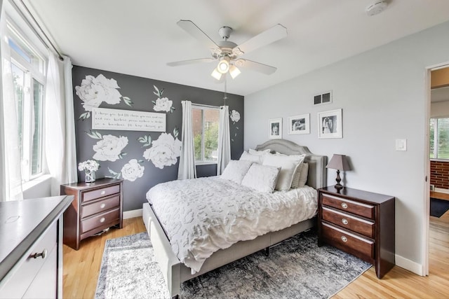 614 Beach Ave, La Grange Park, IL 60526 - bedroom with light wood-style flooring and ceiling fan
