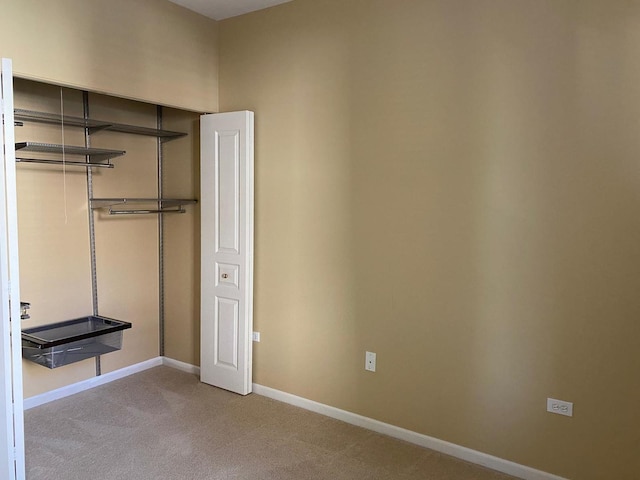 3148 Ollerton Ave Unit 3148, Aurora, IL 60502 - unfurnished bedroom with carpet floors, baseboards, and a closet