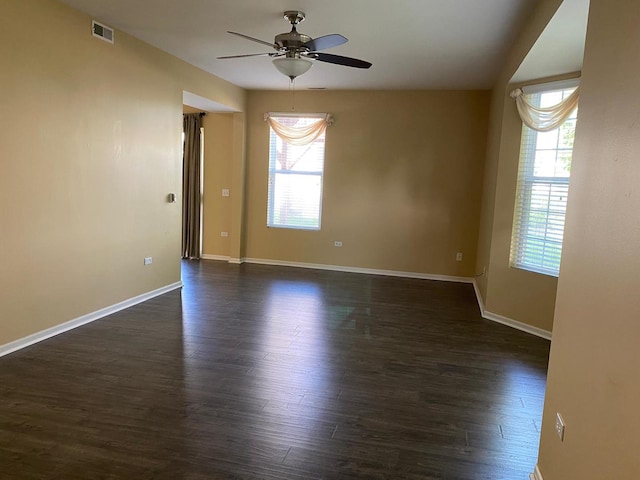 3148 Ollerton Ave Unit 3148, Aurora, IL 60502 - empty room with ceiling fan, plenty of natural light, dark wood-style flooring, and baseboards