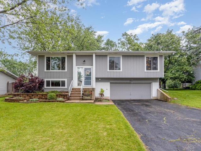352 Falcon Ridge Way, Bolingbrook, IL 60440 - split foyer home with a garage and asphalt driveway