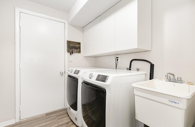 352 Falcon Ridge Way, Bolingbrook, IL 60440 - washroom with cabinet space, separate washer and dryer, and light wood finished floors