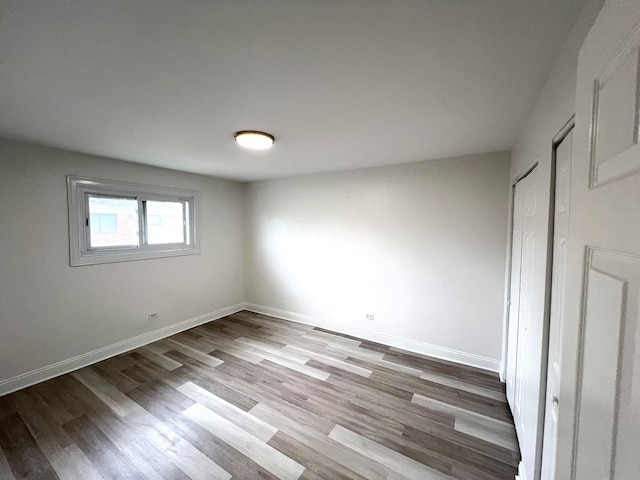 6842 W Lode Dr Unit 3B, Worth, IL 60482 - unfurnished bedroom with wood finished floors and baseboards