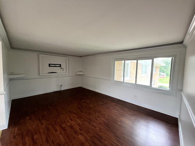 6842 W Lode Dr Unit 3B, Worth, IL 60482 - unfurnished room with dark wood-style floors, ornamental molding, and baseboards