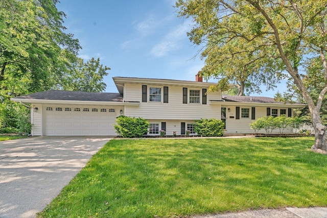 308 Tamarack Ave, Naperville, IL 60540 - split level home with an attached garage, a chimney, a front yard, and concrete driveway