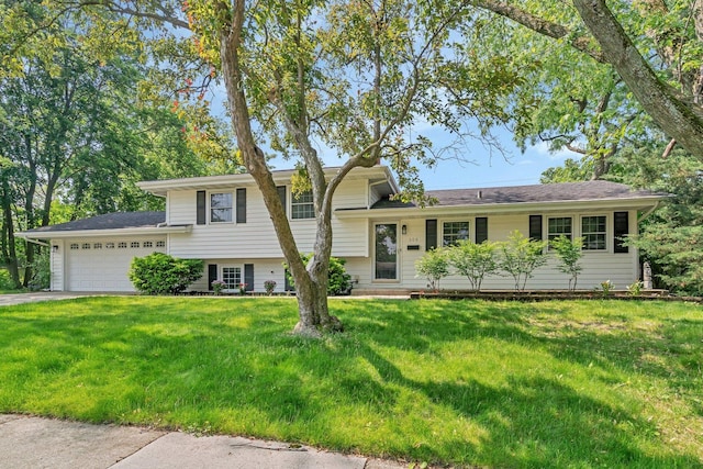 308 Tamarack Ave, Naperville, IL 60540 - tri-level home featuring an attached garage, a front yard, and driveway