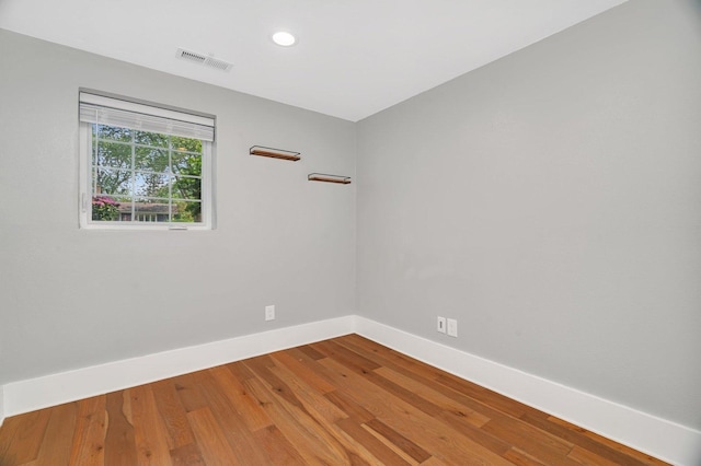 308 Tamarack Ave, Naperville, IL 60540 - spare room with baseboards, wood finished floors, and recessed lighting
