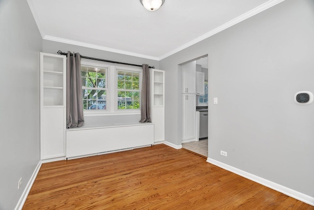 308 Tamarack Ave, Naperville, IL 60540 - unfurnished room featuring crown molding, light wood-style flooring, and baseboards