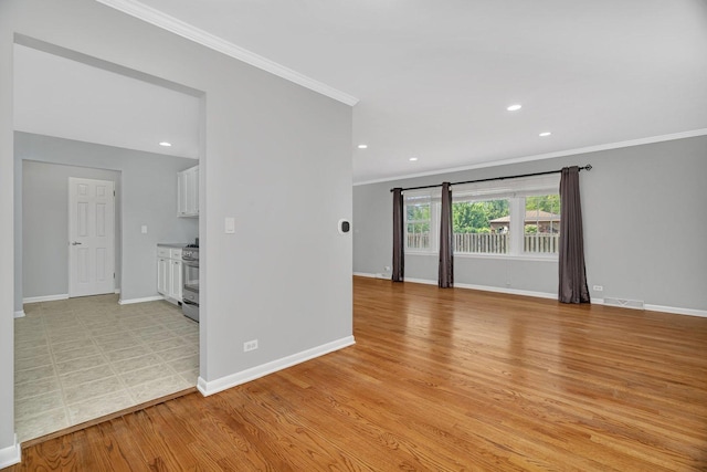 308 Tamarack Ave, Naperville, IL 60540 - unfurnished room featuring ornamental molding, baseboards, light wood-style flooring, and recessed lighting
