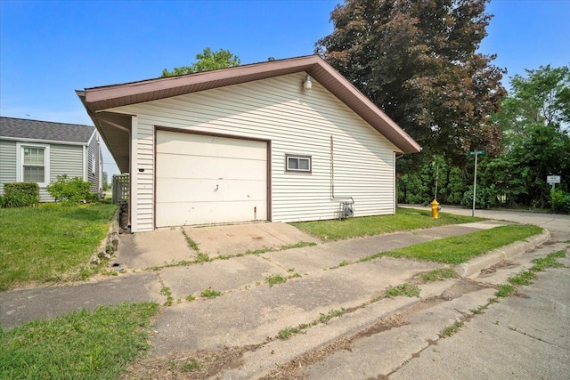 101 Margaret St, Bloomington, IL 61704 - detached garage featuring driveway