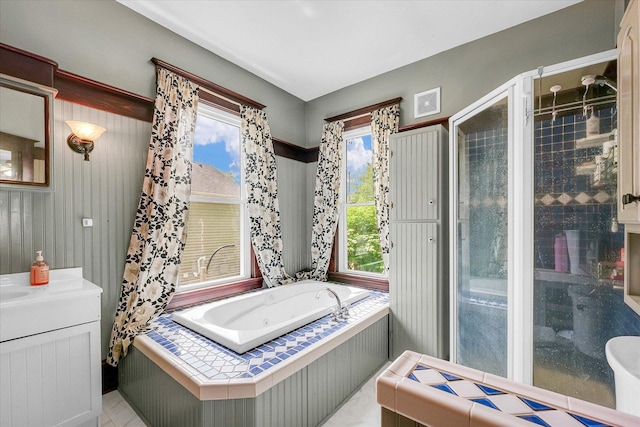 138 N Elm St, Paxton, IL 60957 - bathroom featuring a tub with jets and vanity