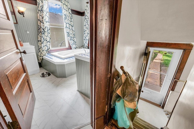 138 N Elm St, Paxton, IL 60957 - bathroom featuring a bath and plenty of natural light