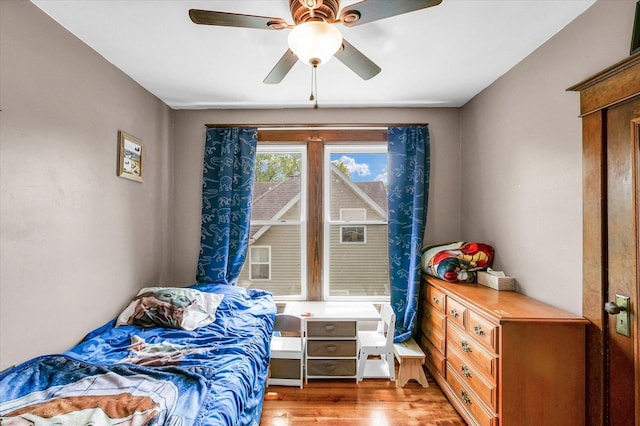 138 N Elm St, Paxton, IL 60957 - bedroom featuring wood finished floors and ceiling fan