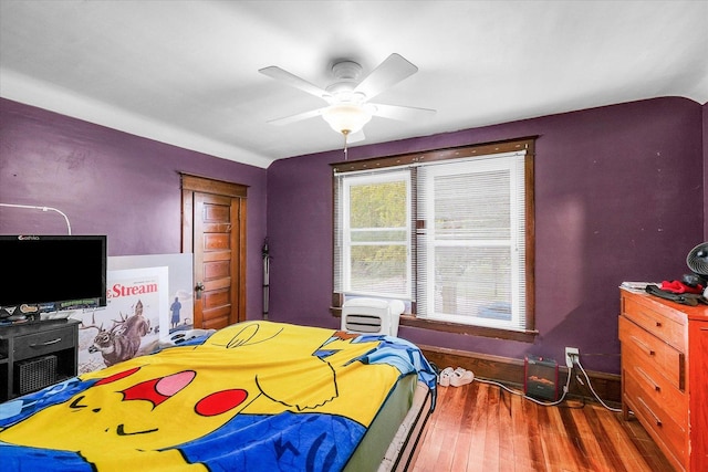 138 N Elm St, Paxton, IL 60957 - bedroom featuring wood finished floors and ceiling fan