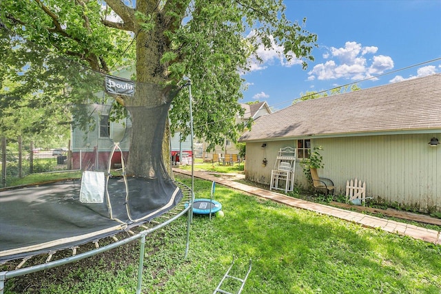 138 N Elm St, Paxton, IL 60957 - view of yard featuring a trampoline