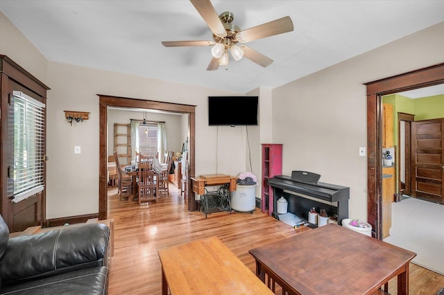 138 N Elm St, Paxton, IL 60957 - living room with plenty of natural light, ceiling fan, and light wood-type flooring