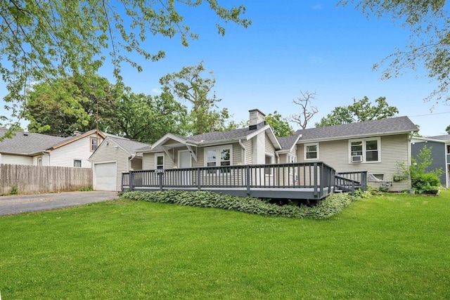 23951 N Lakeside Dr, Lake Zurich, IL 60047 - view of front of house featuring a wooden deck, driveway, a chimney, a garage, and an outdoor structure