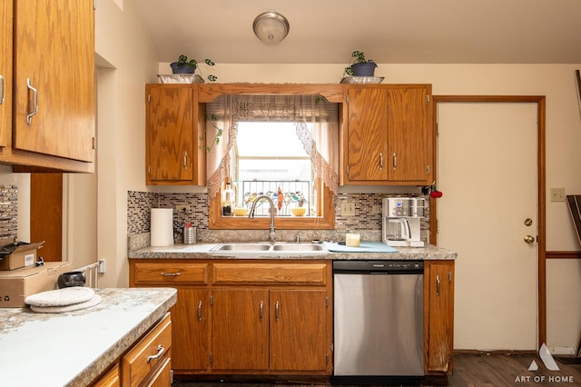 1710 Chestnut Hill Rd, Plainfield, IL 60586 - kitchen featuring dishwasher, a sink, light countertops, and brown cabinetry
