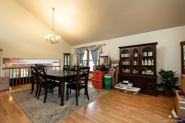 1710 Chestnut Hill Rd, Plainfield, IL 60586 - dining room featuring a chandelier, high vaulted ceiling, and wood finished floors