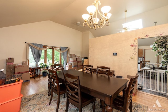 1710 Chestnut Hill Rd, Plainfield, IL 60586 - dining area featuring wood finished floors, a ceiling fan, a chandelier, and high vaulted ceiling