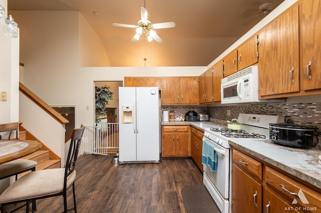1710 Chestnut Hill Rd, Plainfield, IL 60586 - kitchen featuring white appliances, a ceiling fan, brown cabinets, tasteful backsplash, and dark wood-type flooring