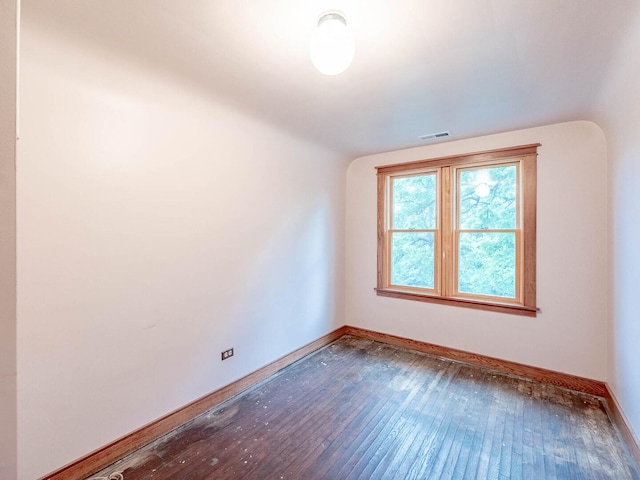 4513 Schwartz Ave, Lisle, IL 60532 - empty room with hardwood / wood-style floors, baseboards, and lofted ceiling