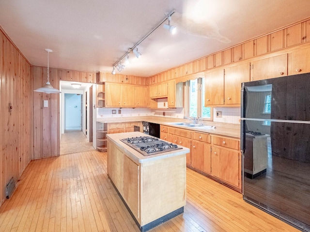 4513 Schwartz Ave, Lisle, IL 60532 - kitchen featuring black appliances, light countertops, light wood-style flooring, open shelves, and track lighting
