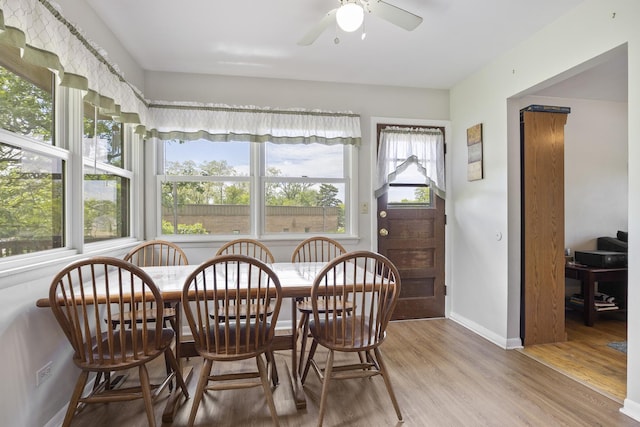 26W331 Geneva Rd, Wheaton, IL 60187 - dining space featuring light wood-style floors, a ceiling fan, and baseboards