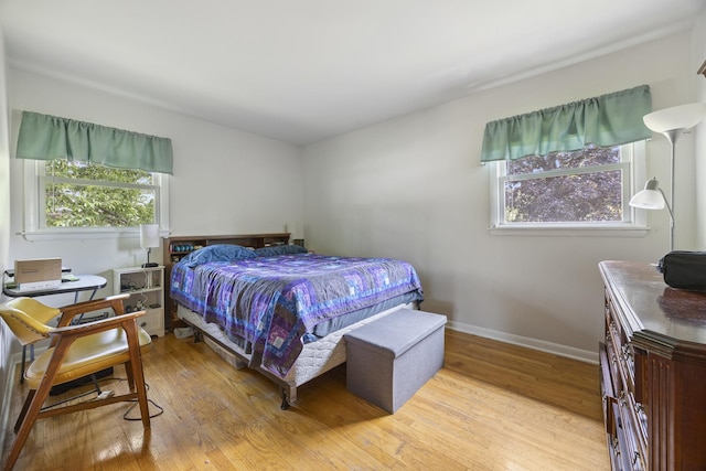 26W331 Geneva Rd, Wheaton, IL 60187 - bedroom with light wood finished floors and baseboards