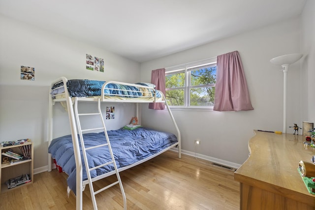 26W331 Geneva Rd, Wheaton, IL 60187 - bedroom with wood finished floors and baseboards