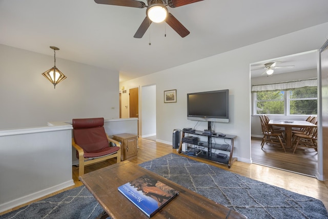 26W331 Geneva Rd, Wheaton, IL 60187 - living room with ceiling fan, wood finished floors, and baseboards