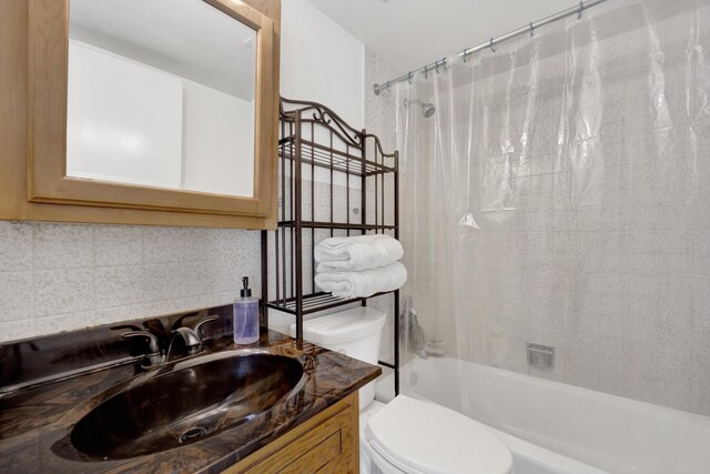 5739 W 63rd St Unit 3S, Chicago, IL 60638 - full bathroom featuring vanity, shower / tub combo, and tasteful backsplash