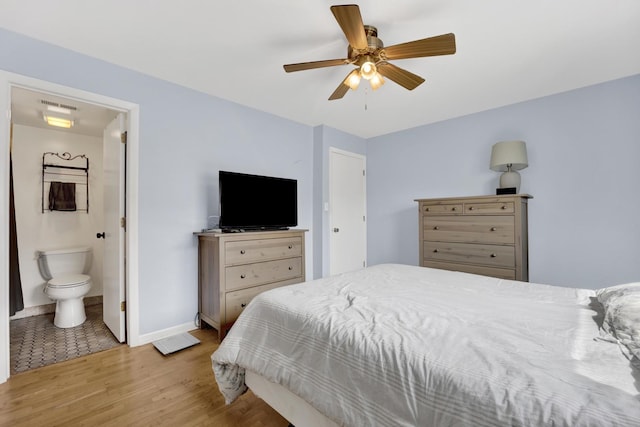 5739 W 63rd St Unit 3S, Chicago, IL 60638 - bedroom featuring light wood-style flooring, a ceiling fan, and ensuite bathroom
