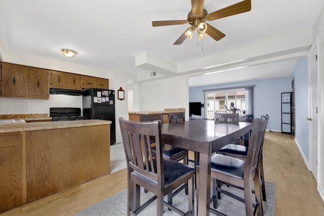 5739 W 63rd St Unit 3S, Chicago, IL 60638 - dining room featuring light wood-type flooring and ceiling fan
