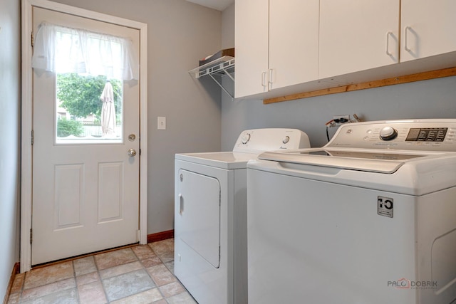 325 Pearl St, Cary, IL 60013 - washroom featuring cabinet space, independent washer and dryer, stone finish floors, and baseboards