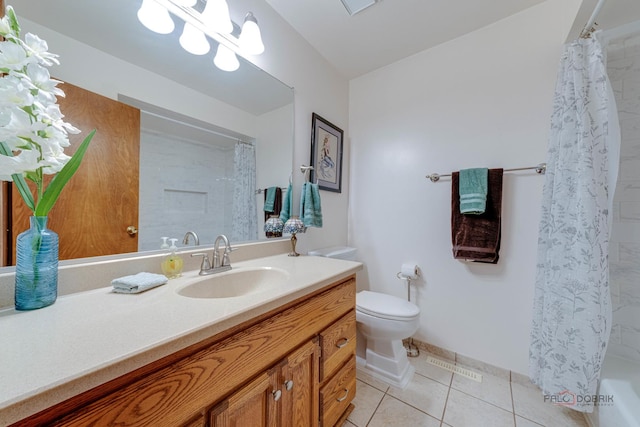 325 Pearl St, Cary, IL 60013 - full bathroom featuring vanity, toilet, and tile patterned floors