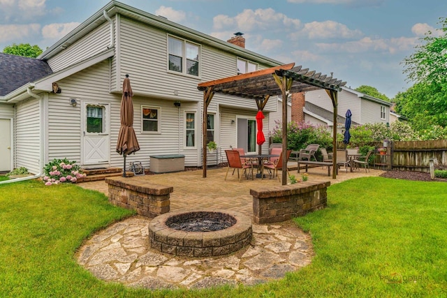 325 Pearl St, Cary, IL 60013 - back of property featuring an outdoor fire pit, a pergola, a patio area, a chimney, and a shingled roof