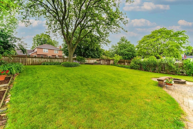 325 Pearl St, Cary, IL 60013 - view of yard featuring an outdoor fire pit and a patio area