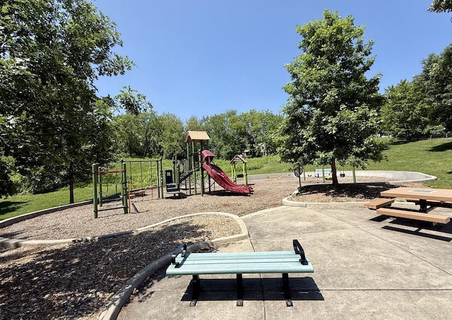 325 Pearl St, Cary, IL 60013 - community playground featuring a yard and view of wooded area