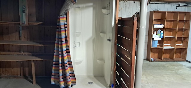 708 S Gretta Ave, Waukegan, IL 60085 - bathroom featuring a shower stall and concrete floors
